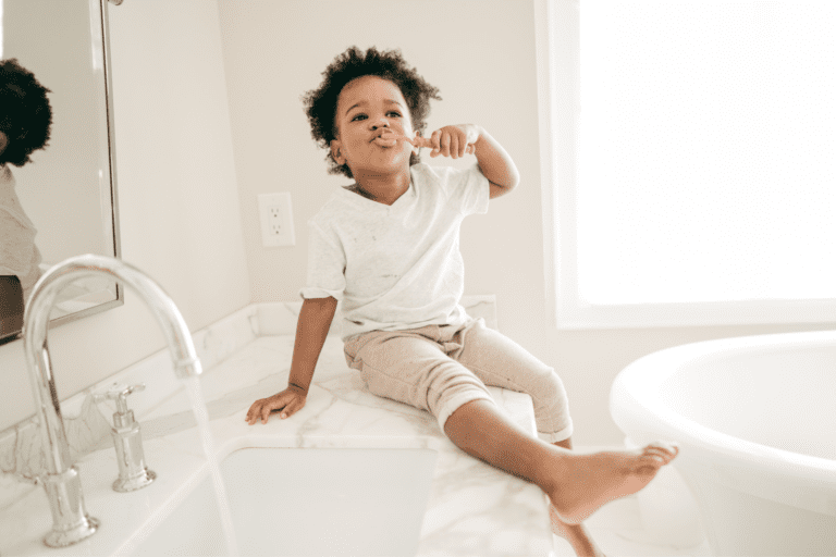 child brushing their teeth