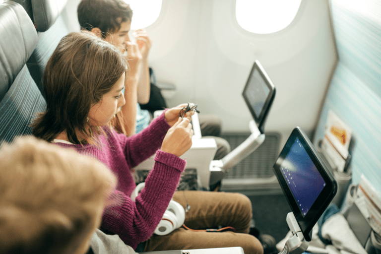 family flying on an airplane